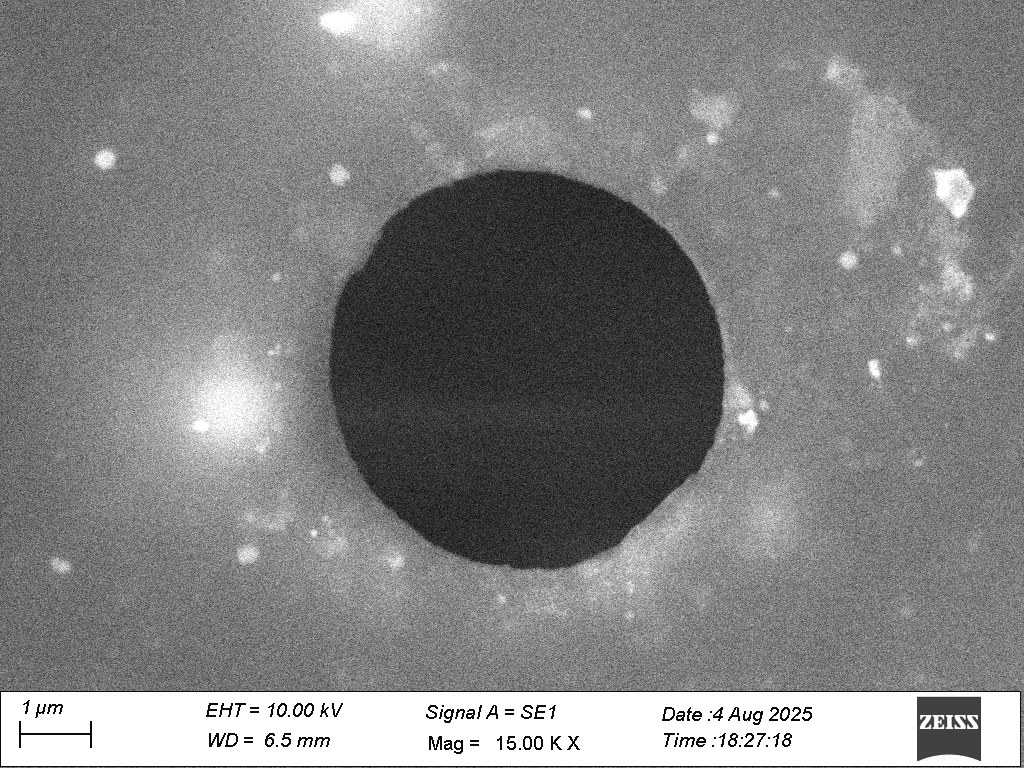 SEM image of a micropore in an ultra-thin glass membrane